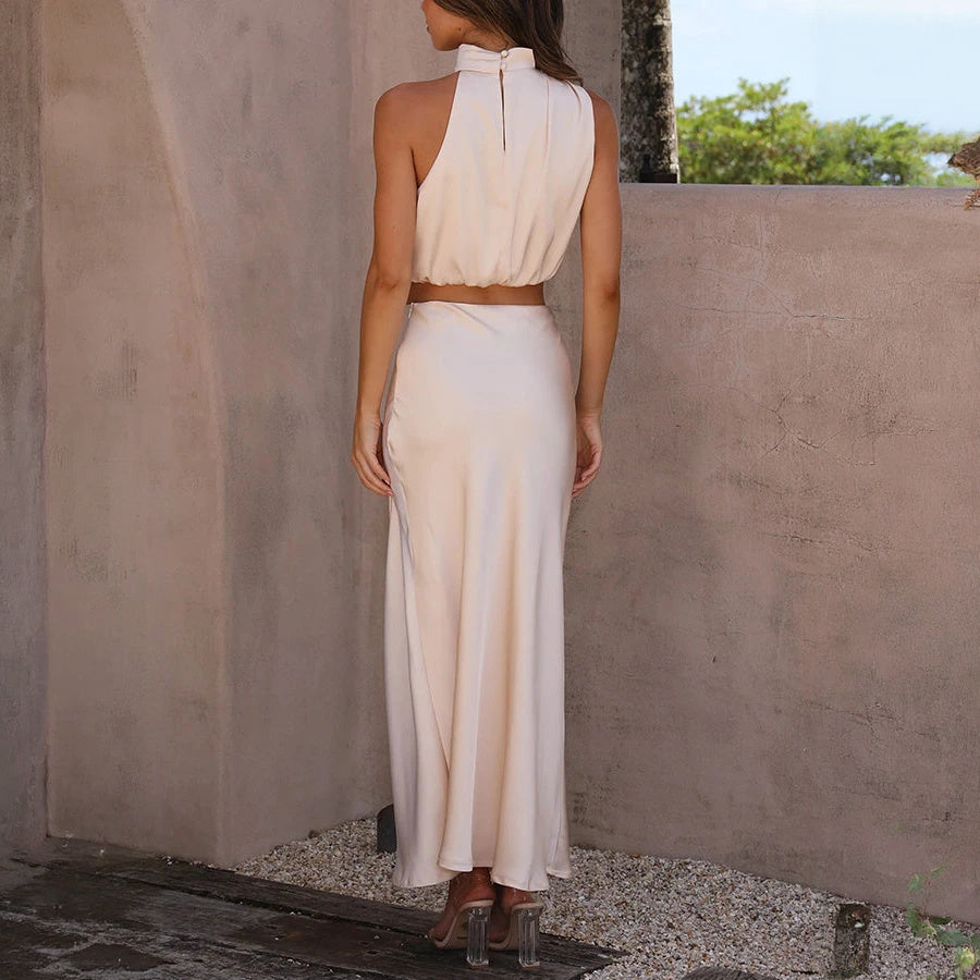 Abito Elegante con Top Halter e Gonna Fluttuante