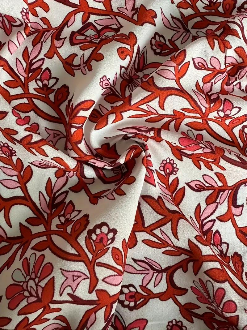 Abito Maxi Floreale con Scollo a V e Vita Annodata Fluida